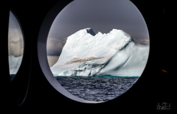 East Antarctica | Blue Berg and Birds From The Galley Porthole