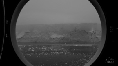 East Antarctica | Icy Iceberg Through The Galley Porthole - Black and White